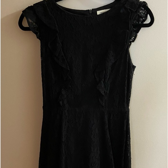 Black lace dress. Above the knee with ruffles. - Picture 1 of 3